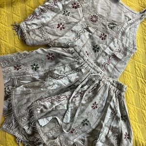 Rayon heavy top and skirt set. Fits like a small/medium